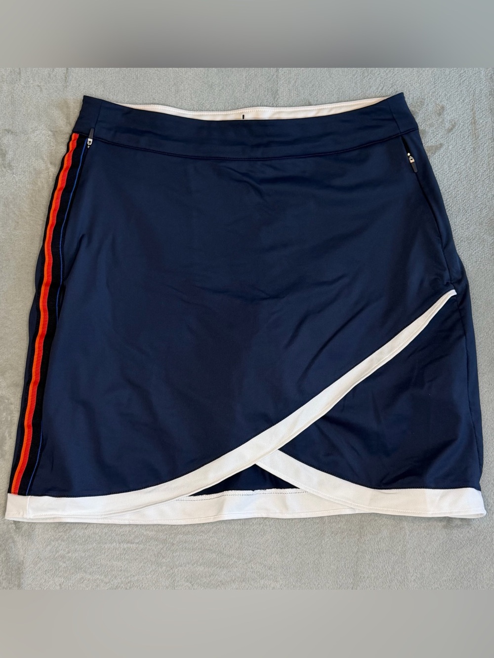 Peter Millar Navy Skort with White Trim and Red-Orange Side Stripe
